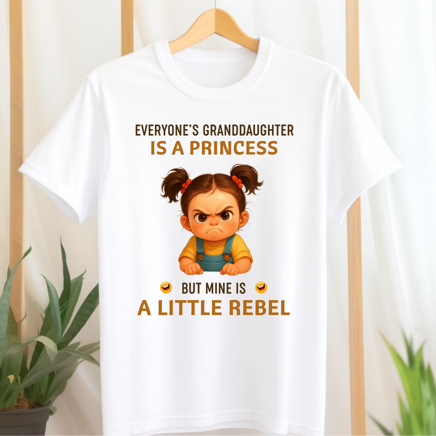 EVERYONE'S GRANDAUGHTER IS A PRINCESS, MINE IS A LITTLE REBEL (KIDS & ADULT T-SHIRT)